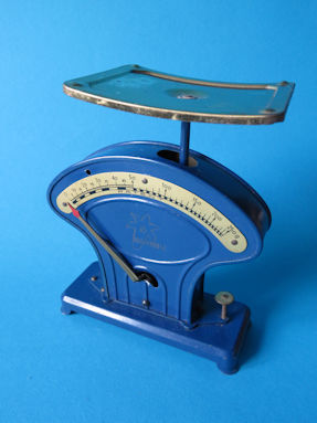 letter scale with advertising for Enzian