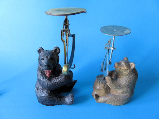 two bears with letter scales