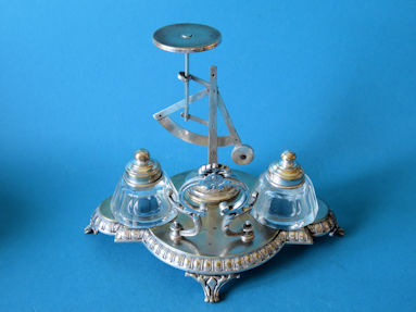 back of the inkstand with letter scale