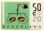 Pair of scales on a Dutch stamp, 1986